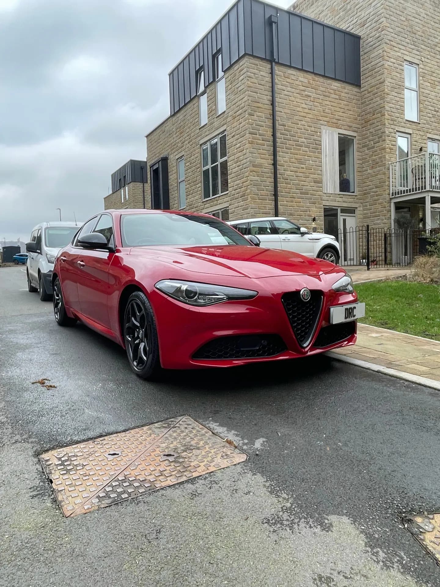 Red Alfa Romeo Giulia after detailing by DRC Car Care