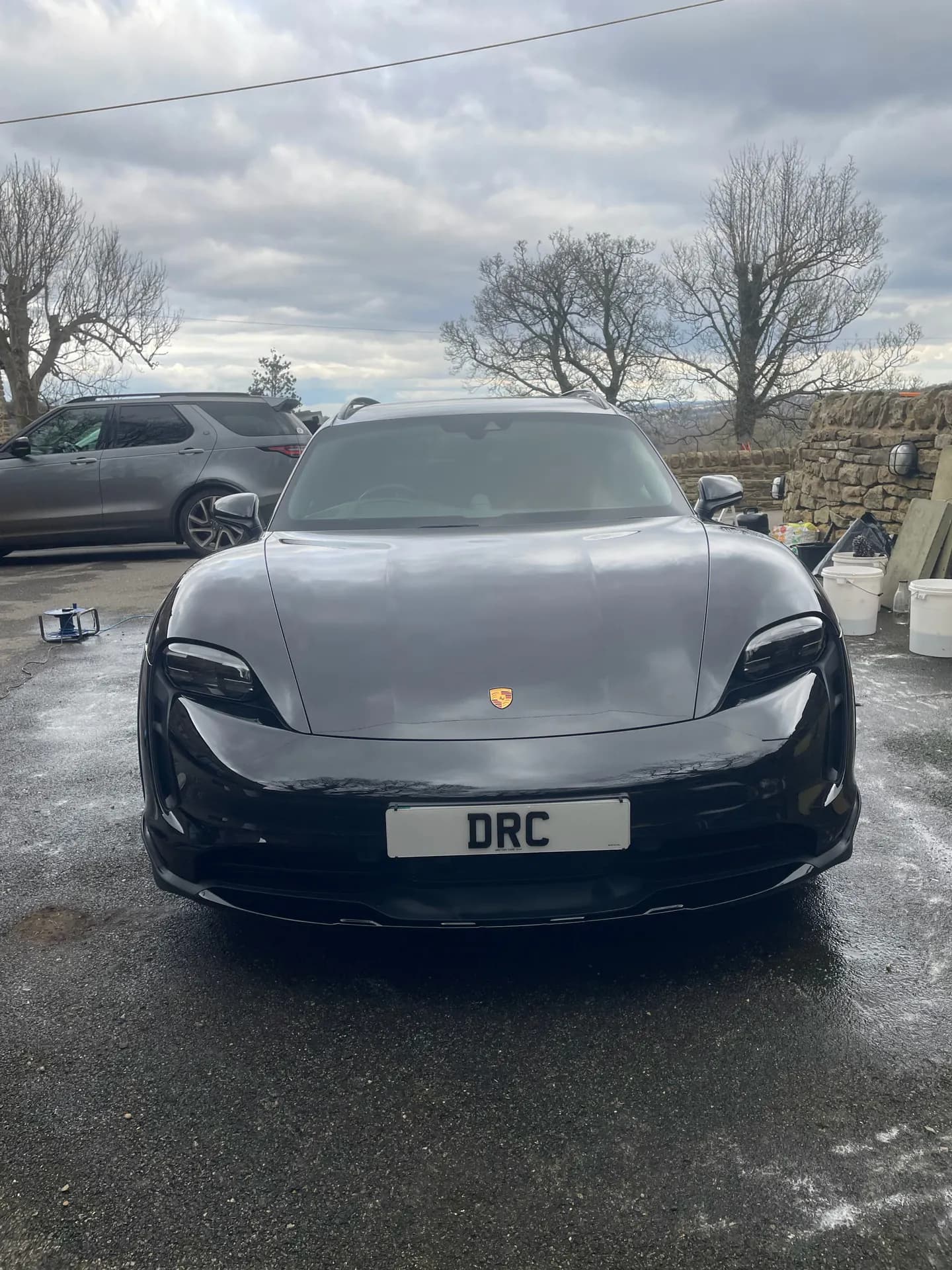 Grey Porsche Taycan after detailing by DRC Car Care